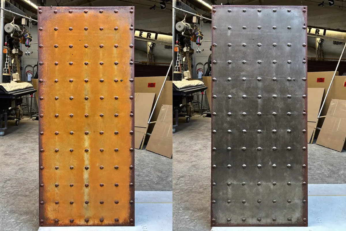 Rust removal by sanding on metal surface during treatment in Bali