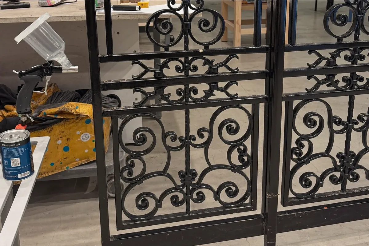 Protective coating spray applied to a metal gate in Bali